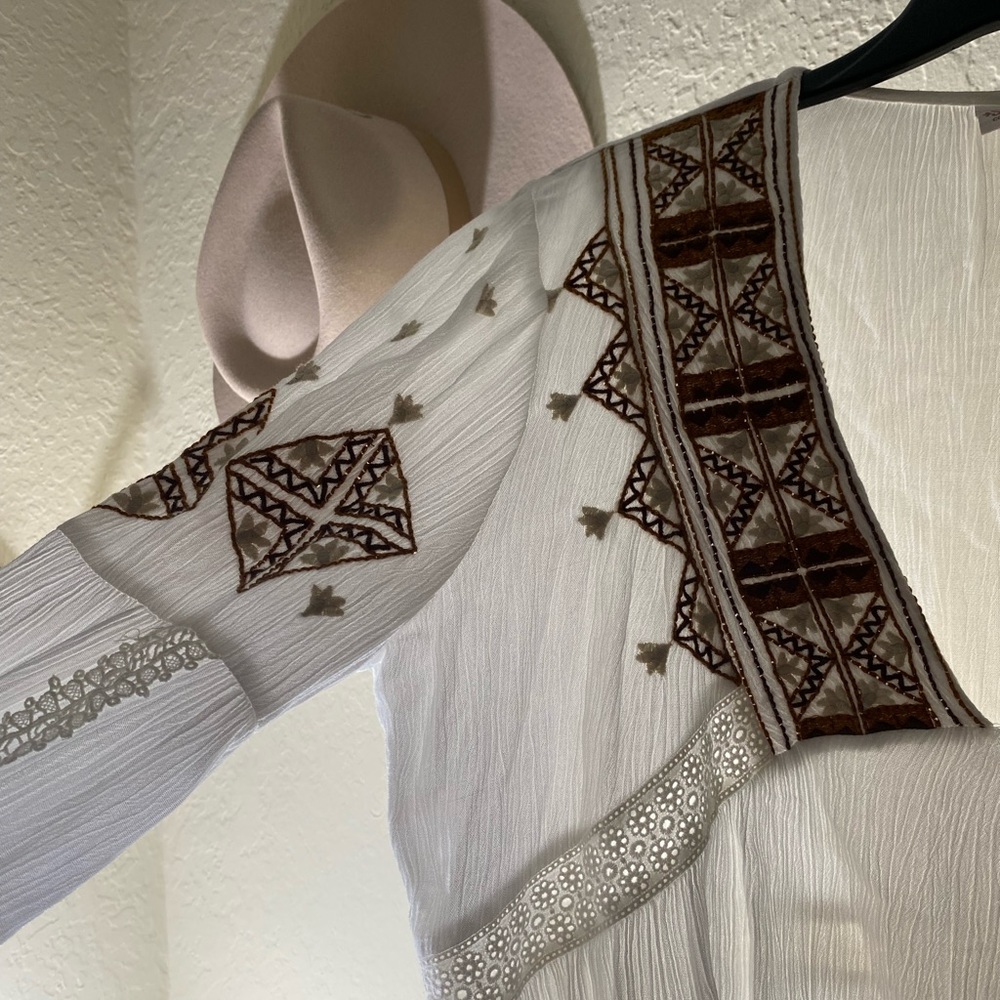 Shyanne Bohemian/Country top with embroidered designs.